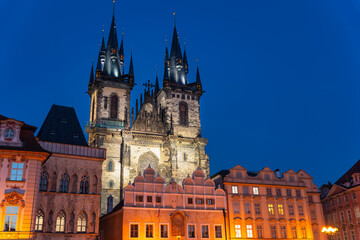 Impressive towers of the Tyn church on Prague's city square.