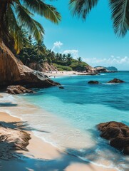 Obraz premium Tropical beach with white sand and turquoise water framed by palm trees