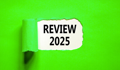 Planning review 2025 new year symbol. Concept words Review 2025 on beautiful white paper. Beautiful green paper background. Business review 2025 new year concept. Copy space.