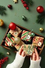Festive Christmas scene with a wooden box of wrapped gifts numbered for an advent calendar....