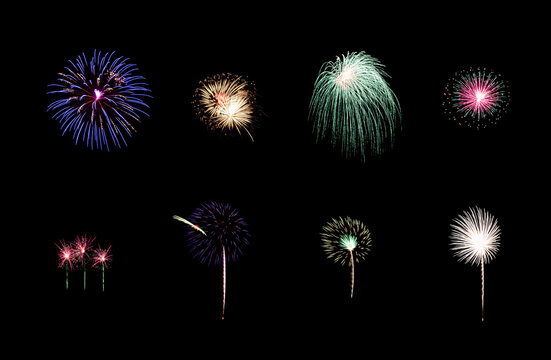 Variety of colorful fireworks isolated on black background