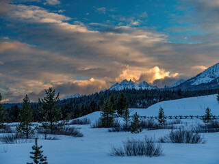 Dramatic clouds over Sawtooth mountain at sunset