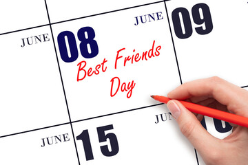 June 8. Hand writing text Best Friends Day on calendar date. Save the date.