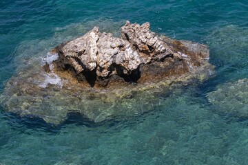 Cliff in the Mediterranean sea, outside Plakis, southern Crete, Greece.