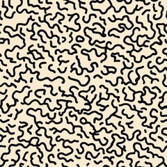 Abstract black squiggly lines on beige background, seamless pattern