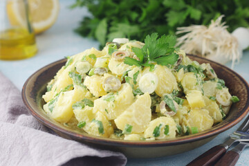 A bowl with Greek potato salads