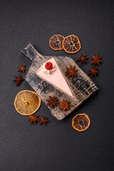 Piece of sweet cake with pink cream with raspberry flavor, with shortbread, cheesecake