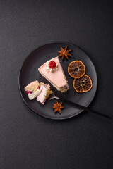Piece of sweet cake with pink cream with raspberry flavor, with shortbread, cheesecake