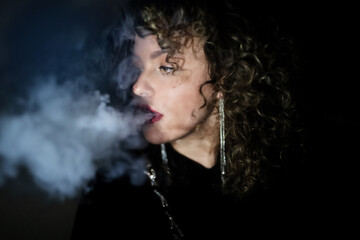 portrait of a beautiful woman with smoke