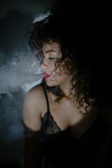 portrait of a beautiful woman with smoke