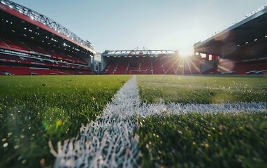 Obraz premium 3D rendering of a large football stadium with bright lights and green grass