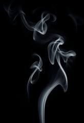 Elegant smoky trails creating mesmerizing abstract forms in motion