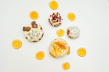 Traditional easter cake with fruits and painted colored eggs. Easter baking. Spring holiday.