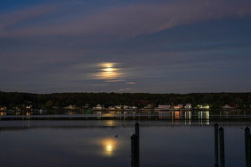 Obraz premium Moonrise Over the Niantic River Shoreline Lights in Niantic Connecticut