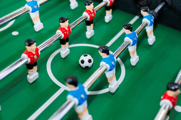 Table football in a modern game room in close-up.