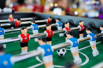 Table football in a modern game room in close-up.