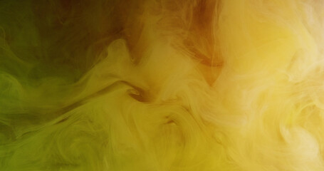 Underwater ink. Vapor flow. Yellow green color splash mist floating texture wave swirl spreading abstract background.