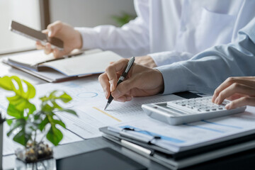 Investor calculating profits on stock market exchange.Investment planing and strategy concept,...