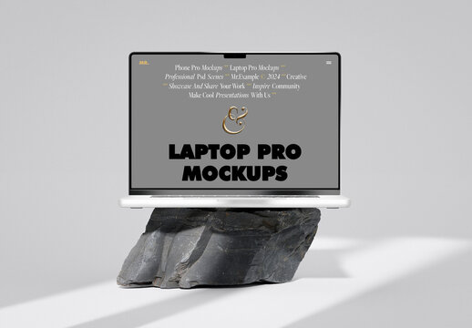 Front View Laptop Pro Laying On Stone Mockup