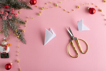 DIY a snowflake with your own hands. Step-by-step origami instructions. Step 7. Top view. flat lay