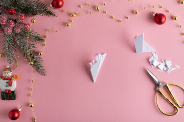 DIY a snowflake with your own hands. Step-by-step origami instructions. Step 8. Top view. flat lay