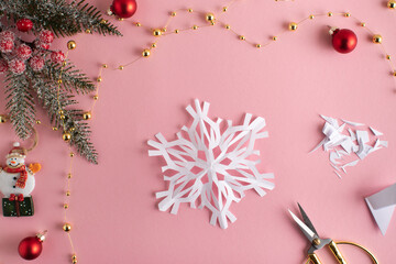 DIY a snowflake with your own hands. Step-by-step origami instructions. Step 10. Top view. flat lay