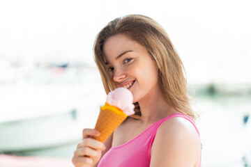 Young redhead woman at outdoors