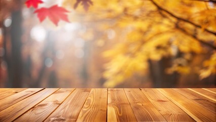 A wooden table adorned with vibrant autumn leaves in the background, showcasing the beauty of the season.