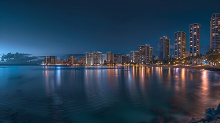Obraz premium **: A panoramic night view of the Honolulu skyline with the ocean front, the city lights creating a mesmerizing reflection on the calm ocean waters.