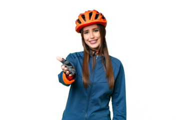 Young cyclist woman over isolated chroma key background shaking hands for closing a good deal