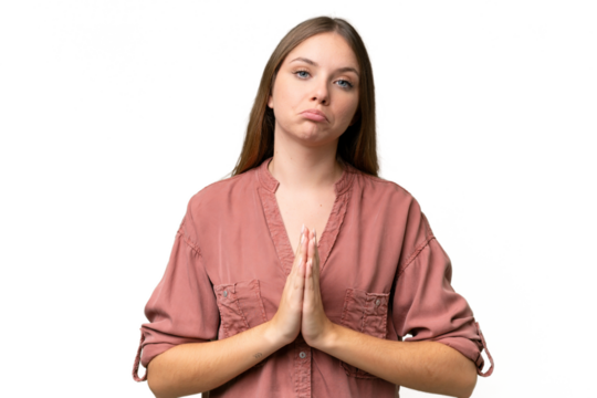 Young beautiful blonde woman over isolated background keeps palm together. Person asks for something