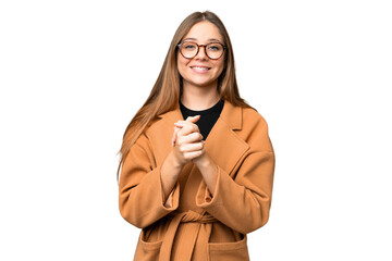 Young blonde woman over isolated chroma key background laughing
