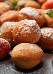 Mini Strawberry Doughnuts on stone board