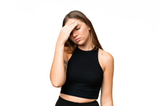 Young blonde woman over isolated chroma key background with headache