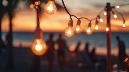 People enjoying the night by the sea with twinkling lights, great for coastal events or summer nights