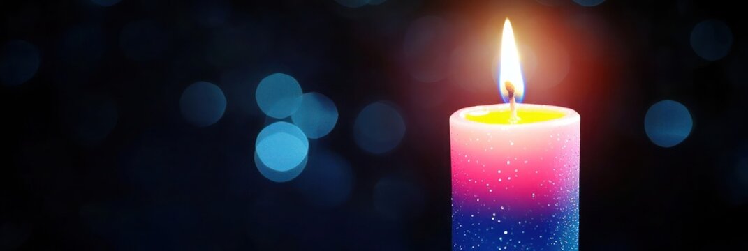 A single Christmas candle with a radiant glow, transitioning from neon pink to midnight blue, softly illuminated against a dark background