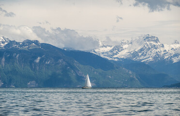 Serene Lake Geneva with Snowy Alps in the Background