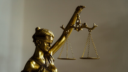 Golden Lady Justice Statue with Scales of Balance