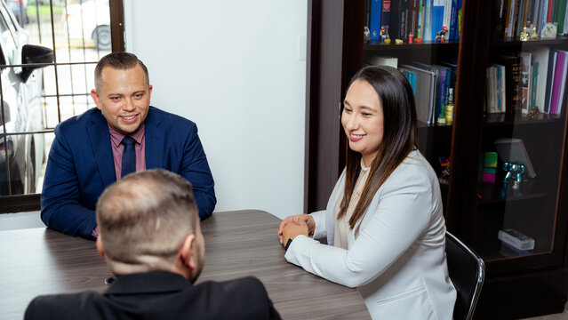 Professional meeting in an office setting with lawyers engaged