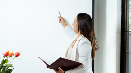 Professional Woman Presenting at Business Meeting with Confidence