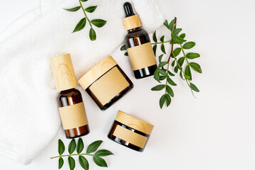 Elegant cosmetics set with natural elements and towel aesthetic