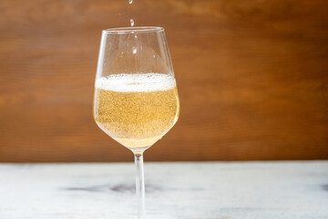champagne pouring into glass
