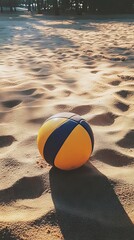 Beach Volleyball: A Yellow Ball on Sand
