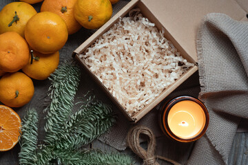 Open gift box with filler. Flat lay, top view, empty space , Christmas background