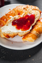 Croissant with jam French toast fresh tasty food dish Delicious gourmet food background on the table rustic food top view copy space