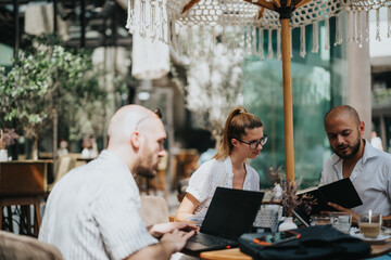 Startup team in a business meeting discussing, brainstorming, and strategizing outdoors at a casual setting