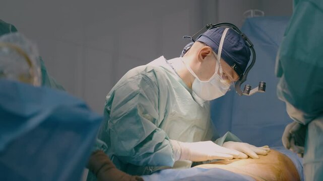 Doctor in uniform man surgeon physician team of medics nurse assist prepare for surgical operation hospital clinic plastic surgery patient health emergency help medical treatment disease healthcare
