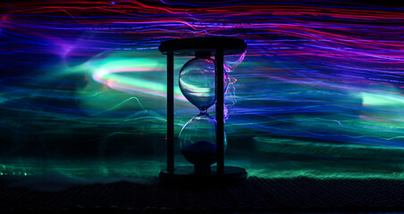 Hourglass as time passing concept for business deadline, urgency and running out of time....