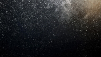 Fototapeta premium Snow particles floating in the air against a black background, with a grainy texture, dust, grunge, and simulated dust and scratches.