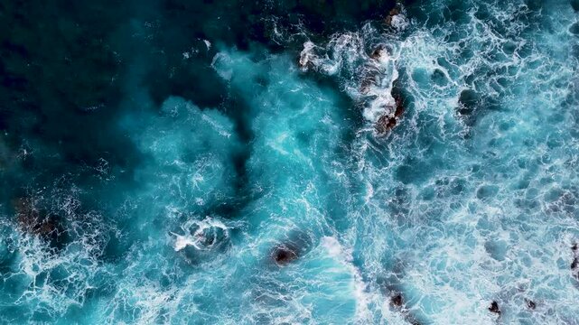 Atlantic ocean waves, rocks, cliffs, waves and turquoise water in Atlantic ocean, Mosteiros, Azores islands. Aerial 4K drone video footage of Acores archipelago